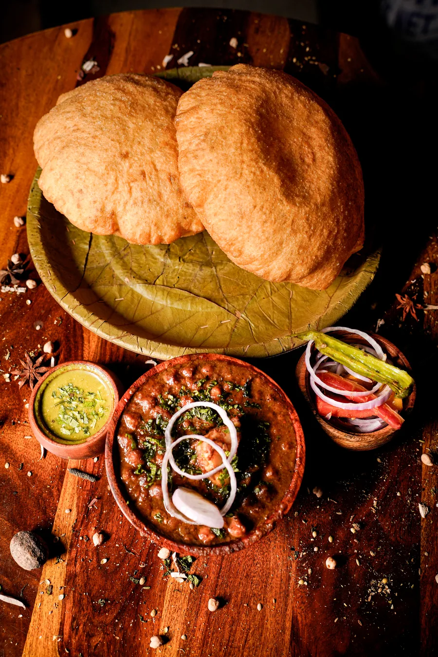 Bhature and chole on a leaf plate